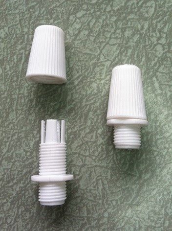 white plastic screw top strain relief for cloth-covered wire