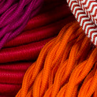 red, orange, pink cloth-covered wire