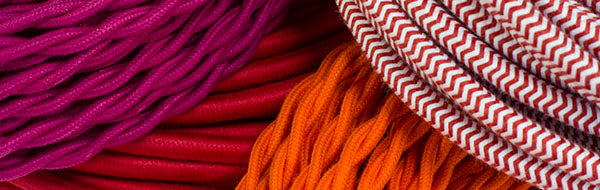 red, orange, pink cloth-covered wire